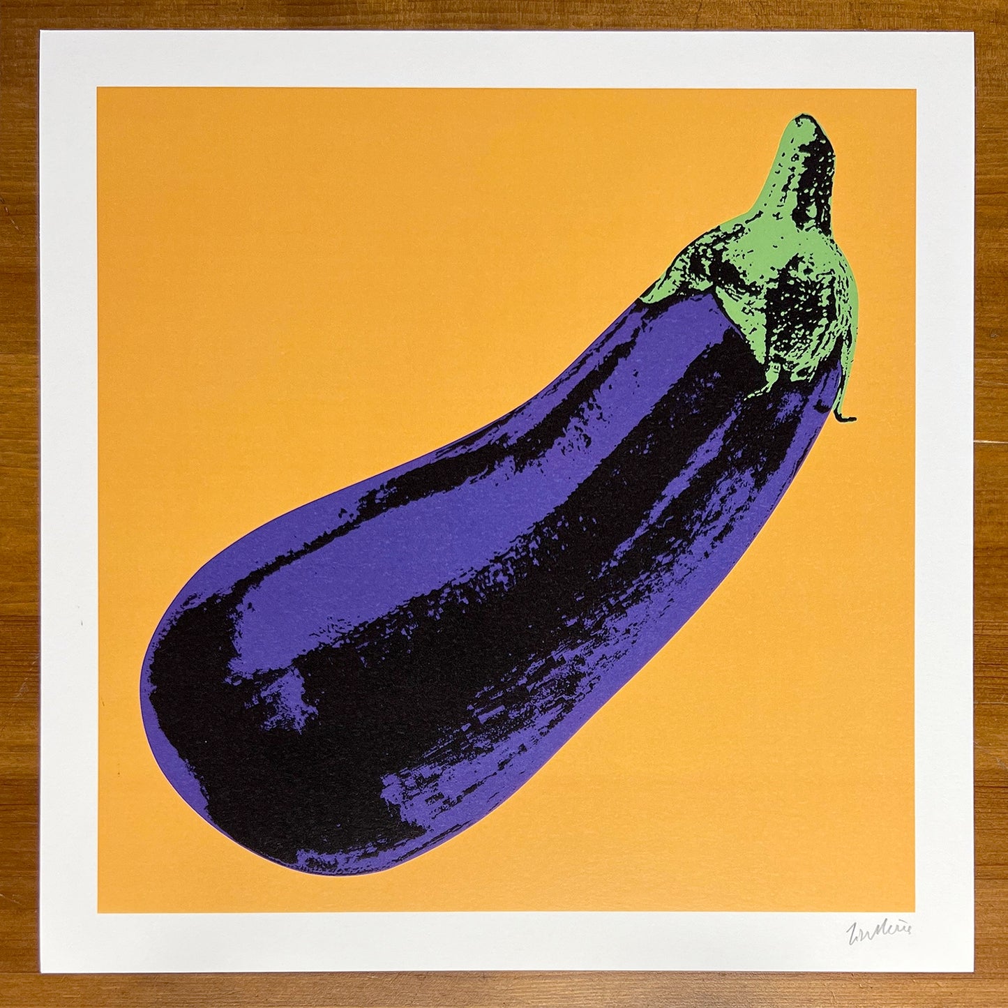 Artwork of an eggplant on a yellow background